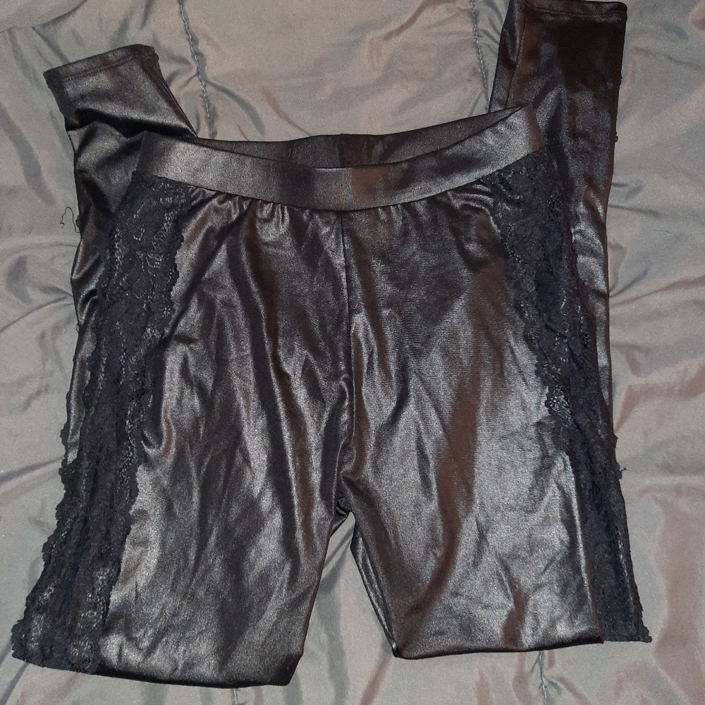Black leggings with lace on sides.